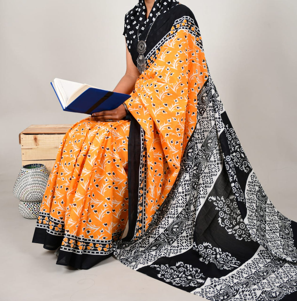 Colorful saree with intricate patterns on a white background